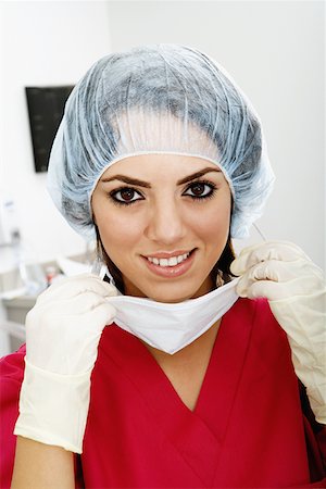 Close-up of a female surgeon smiling Stock Photo - Premium Royalty-Free, Code: 625-01251943