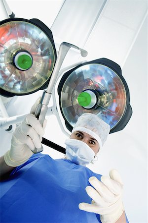 simsearch:625-01252179,k - Close-up of a female surgeon holding a surgical equipment Stock Photo - Premium Royalty-Free, Code: 625-01252046
