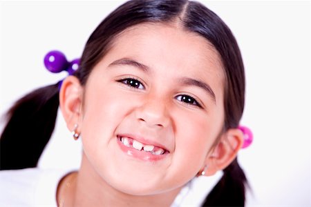 simsearch:625-01251733,k - Portrait d'une jeune fille souriant Photographie de stock - Premium Libres de Droits, Code: 625-01252114