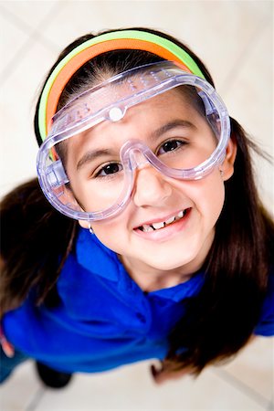 Portrait of a girl wearing a snorkel and smiling Stock Photo - Premium Royalty-Free, Code: 625-01252118