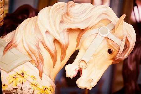 Gros plan d'un cheval de carrousel Photographie de stock - Premium Libres de Droits, Code: 625-01252393