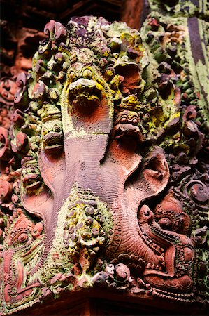 Snakes carved on a wall, Banteay Srei, Angkor, Siem Reap, Cambodia Stock Photo - Premium Royalty-Free, Code: 625-01264457