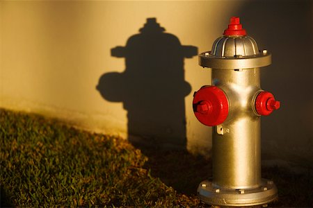 Close-up of an open fire hydrant Fotografie stock - Premium Royalty-Free, Codice: 625-01260566