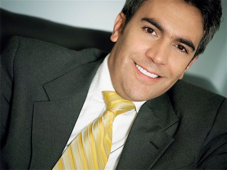 simsearch:625-01096675,k - Portrait of a businessman smiling Stock Photo - Premium Royalty-Free, Code: 625-01260823