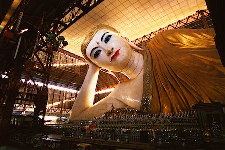 Low angle view of a Reclining Buddha in a pagoda, Chauk Htat Gyi Pagoda, Yangon, Myanmar Stock Photo - Premium Royalty-Free, Code: 625-01260992