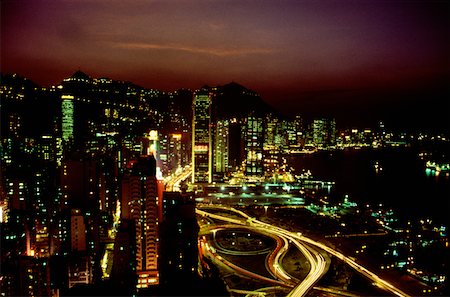 High angle view of buildings lit up at night, Causeway Bay, Hong Kong, China Stock Photo - Premium Royalty-Free, Code: 625-01261226