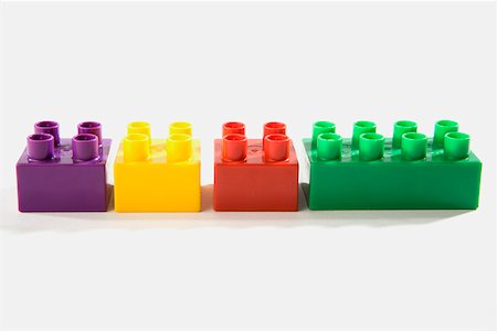 Close-up of plastic block toys Foto de stock - Sin royalties Premium, Código: 625-01261470