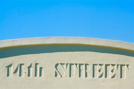 Close-up of a street name carved on the wall Stock Photo - Premium Royalty-Free, Code: 625-01262038