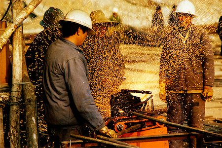 Construction workers working at a construction site, Beijing, China Stock Photo - Premium Royalty-Free, Code: 625-01262513