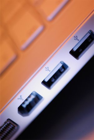 simsearch:625-02926804,k - Close-up of a USB port of a laptop Foto de stock - Sin royalties Premium, Código: 625-01262612