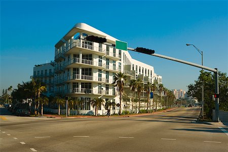 Low angle view of a multi- storeyed building on the roadside Miami, Florida, USA Stock Photo - Premium Royalty-Free, Code: 625-01262817