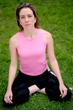simsearch:625-01747375,k - High angle view of a young woman sitting in the lotus position Stock Photo - Premium Royalty-Free, Code: 625-01263019