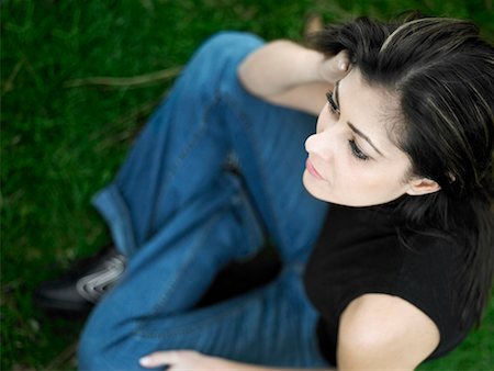 simsearch:625-01747375,k - High angle view of a mid adult woman sitting on a lawn Stock Photo - Premium Royalty-Free, Code: 625-01263103