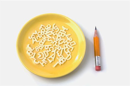 erasing numbers - Close-up of a plate and a pencil Stock Photo - Premium Royalty-Free, Code: 625-01263600