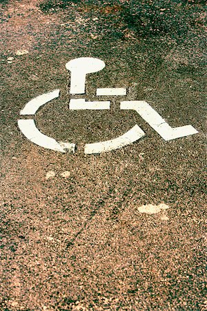 High angle view of a disabled sign on the road Stock Photo - Premium Royalty-Free, Code: 625-01263707