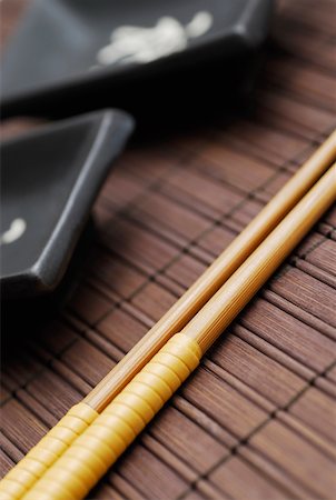 simsearch:625-01251856,k - Close-up of two chopsticks on a mat Stock Photo - Premium Royalty-Free, Code: 625-01263995