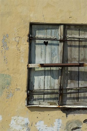 simsearch:625-00840350,k - Close-up of an old window on a weathered wall Stock Photo - Premium Royalty-Free, Code: 625-01744114