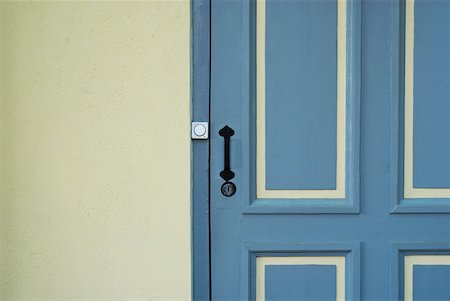 doorknobs - Close-up of a closed door Stock Photo - Premium Royalty-Free, Code: 625-01744170