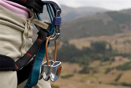 extreme sports and connect - Mid section view of a rock climber carrying rock climbing equipments Stock Photo - Premium Royalty-Free, Code: 625-01744253