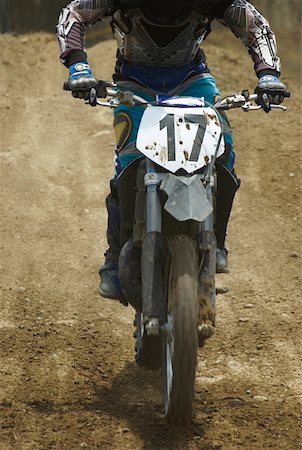 simsearch:625-01744331,k - Motocross rider riding a motorcycle Foto de stock - Sin royalties Premium, Código: 625-01744266