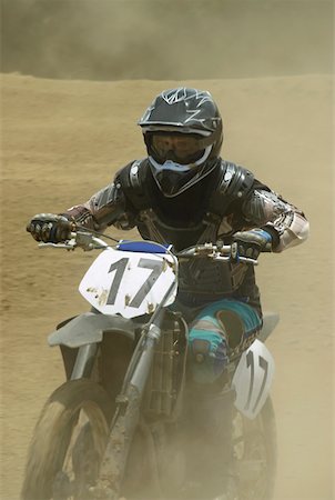 simsearch:625-01744331,k - Motocross rider riding a motorcycle Foto de stock - Sin royalties Premium, Código: 625-01744325