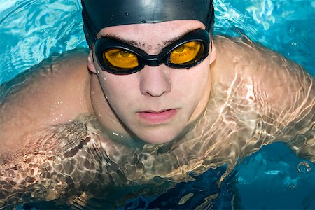simsearch:625-01038267,k - Portrait of a young man in a swimming pool Stock Photo - Premium Royalty-Free, Code: 625-01744387