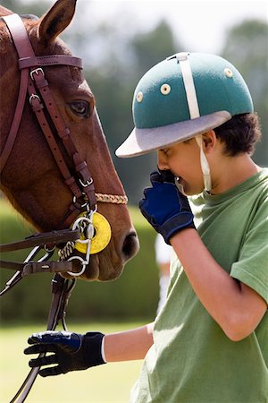 Adolescent, debout avec un cheval Photographie de stock - Premium Libres de Droits, Code: 625-01744513