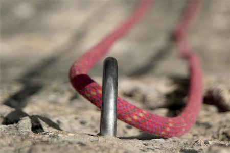 extreme rock climbing close up - Rock climbing rope in a hook Stock Photo - Premium Royalty-Free, Code: 625-01744713