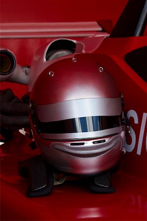 sport car speed - Close-up of a crash helmet on a racecar Stock Photo - Premium Royalty-Free, Code: 625-01744741