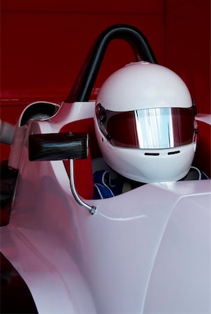 simsearch:625-01744655,k - Close-up of a racecar driver in a racecar Stock Photo - Premium Royalty-Free, Code: 625-01744853