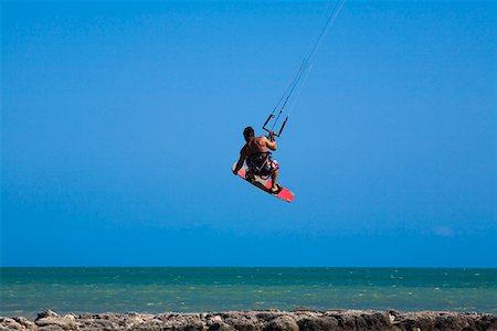 simsearch:625-01040859,k - Rear view of a man kite boarding, Smathers Beach, Key West, Florida USA Stock Photo - Premium Royalty-Free, Code: 625-01744878