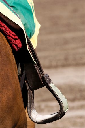 steigbügel - Nahaufnahme von einem Steigbügel auf einem Pferd Stockbilder - Premium RF Lizenzfrei, Bildnummer: 625-01744956