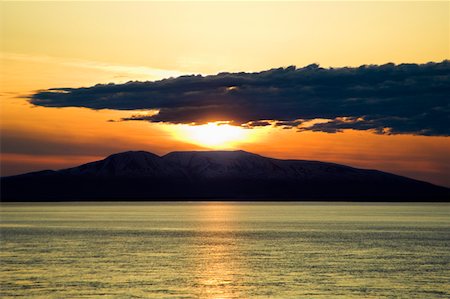 Sunset over an island, Fire Island, Alaska, USA Stock Photo - Premium Royalty-Free, Code: 625-01745586