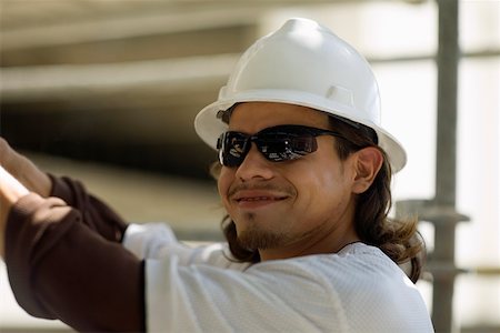 simsearch:625-01745814,k - Close-up of a male construction worker smiling Stock Photo - Premium Royalty-Free, Code: 625-01745859