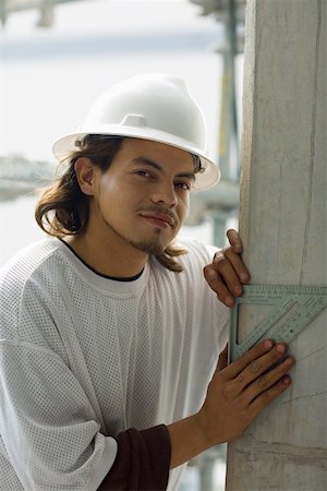 simsearch:625-01745814,k - Portrait of a male construction worker using a set square Stock Photo - Premium Royalty-Free, Code: 625-01745853