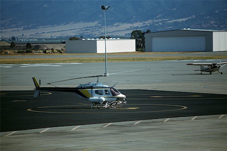 Hélicoptère gréé pour irrigation aérienne Photographie de stock - Premium Libres de Droits, Code: 625-01745976