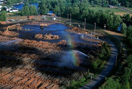 rainbow, road - Watering logs to reduce heat buildup, sawmill, Idaho Stock Photo - Premium Royalty-Free, Code: 625-01746036