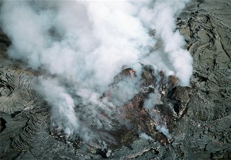 polynesian volcano - Plumes of stream rising from molten lava, Hawaii Stock Photo - Premium Royalty-Free, Code: 625-01746083