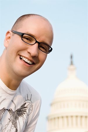 simsearch:625-01038429,k - Close-up of a mid adult man smiling in front of a building, Capitol Building, Washington DC, USA Foto de stock - Sin royalties Premium, Código: 625-01746276