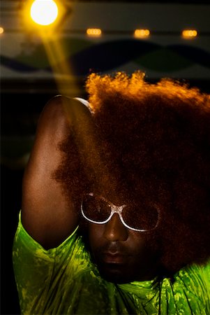 Close-up of a mid adult man dancing in a disco Stock Photo - Premium Royalty-Free, Code: 625-01746283