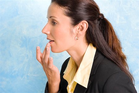 simsearch:625-02932995,k - Close-up of a businesswoman applying cream on her lips Stock Photo - Premium Royalty-Free, Code: 625-01746655