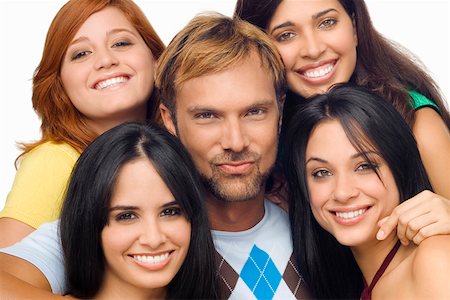 simsearch:625-01746515,k - Portrait of a mid adult man posing with four young women Fotografie stock - Premium Royalty-Free, Codice: 625-01746697