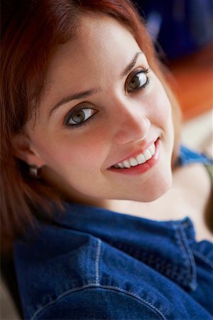 Portrait of a young woman smiling Stock Photo - Premium Royalty-Free, Code: 625-01746926