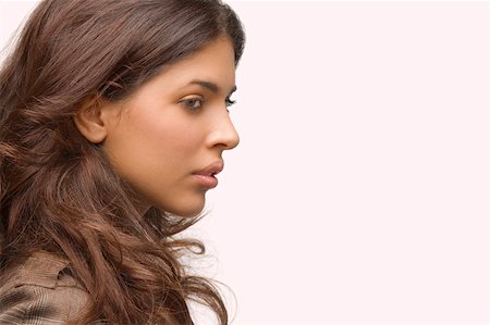 simsearch:625-01747375,k - Side profile of a young woman thinking Stock Photo - Premium Royalty-Free, Code: 625-01747117