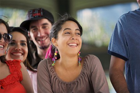 simsearch:625-01747650,k - Close-up of three young women and a young man smiling Stock Photo - Premium Royalty-Free, Code: 625-01747135