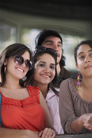 simsearch:625-01747521,k - Close-up of three young women standing with a young man Foto de stock - Sin royalties Premium, Código: 625-01747748