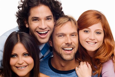 Portrait of a mid adult man smiling with his friends Stock Photo - Premium Royalty-Free, Code: 625-01747856