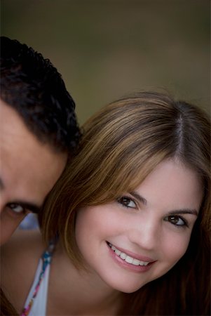 simsearch:625-01746515,k - Portrait of a young couple smiling Fotografie stock - Premium Royalty-Free, Codice: 625-01747871