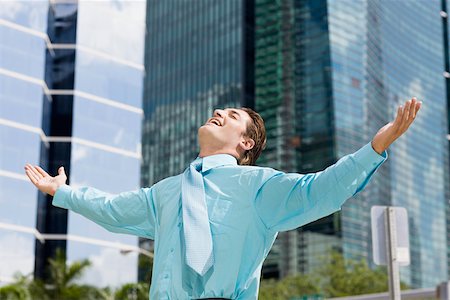 simsearch:625-01096675,k - Businessman standing with his arms outstretched Stock Photo - Premium Royalty-Free, Code: 625-01748347