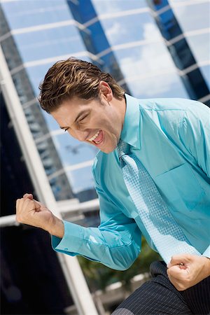 simsearch:625-01096766,k - Businessman making fists in excitement Stock Photo - Premium Royalty-Free, Code: 625-01748352